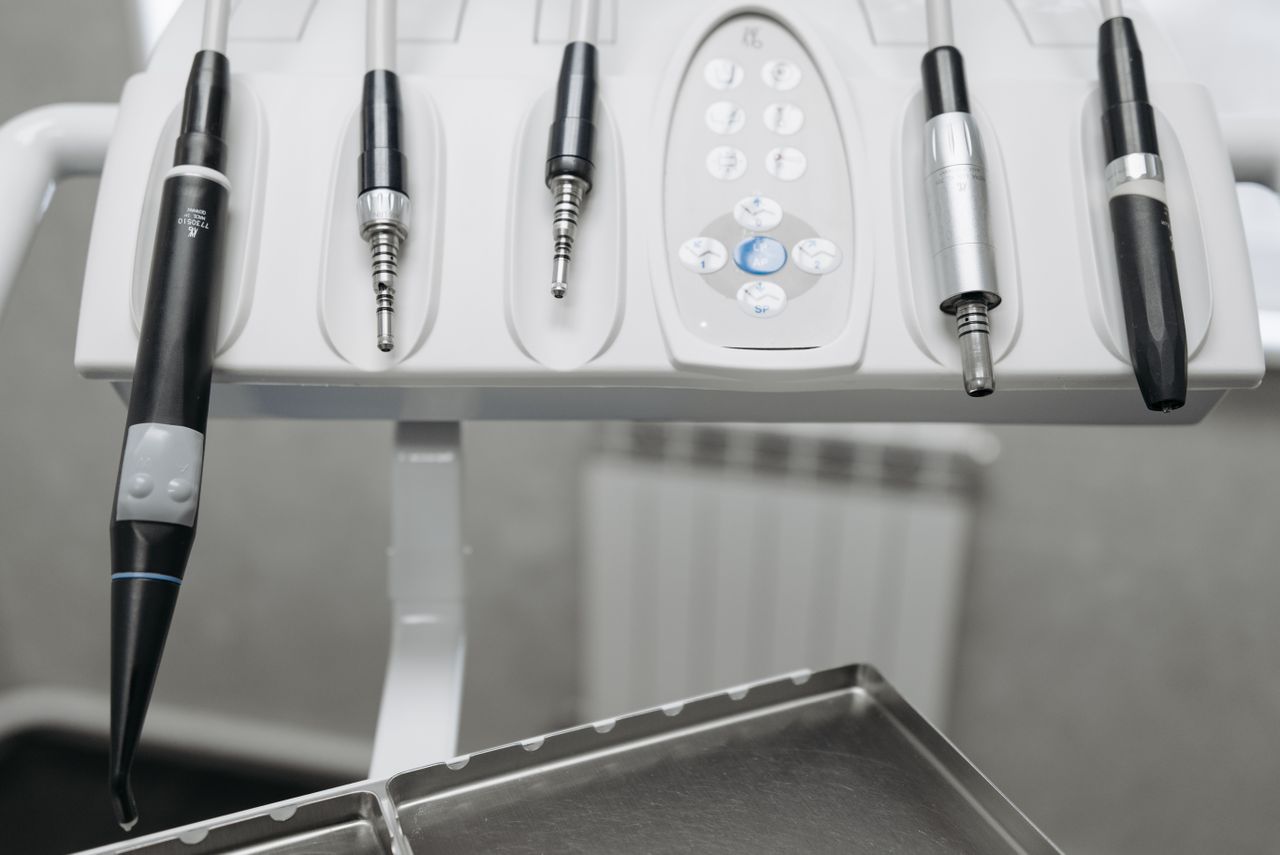 Detailed shot of modern dental tools in a dentists office, emphasizing precision and hygiene.